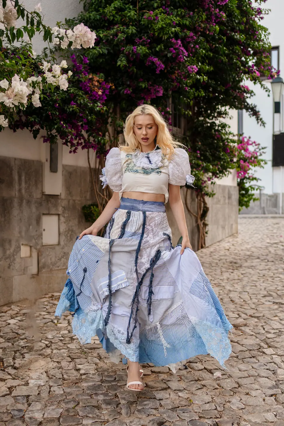Navy corded lace off-shoulder blouse with white lace flares